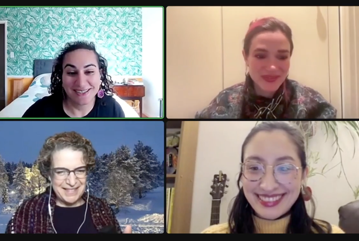 Screenshot of a Zoom meeting with four participants. On the top left is Alex Hanna, an Arab woman with curly black hair. toher shoulders. She wears dangly earrings and a black top. The room behind her appears to be a hotel room, with a white-quilted bed and teal patterned walls. On the top right is Eleanor Drage, a white woman with straight brown hair pulled back. She is wearing a patterned floral top. Behind her is an off-white wall. On the bottom right is Kerry McInerney, an Asian woman with long black hair half pulled behind her head. She wears glasses, red lipstick and a yellow top. The room behind her has a plant and a guitar. On the bottom left is Emily M. Bender, a white woman with curly brown hair. She wears glasses and a purple shawl over her black shirt. The image behind her is of snow-covered confier trees under a dark night sky.