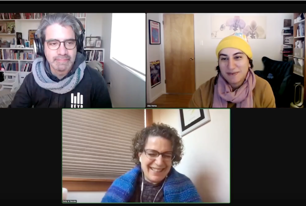 Screenshot of a Zoom meeting with three participants. In the bottom center is Emily Bender, a white woman with short-ish curly brown hair. She wears glasses and has a blue scarf draped over her shoulders. Behind her is a white wall and some closed beige window blinds. On the top right panel is Alex Hanna, an Arab woman with medium-length black hair. She is wearing a yellow knit cap, a mustard yellow cardigan, and a pink scarf around her neck. Behind her is a room with bookshelves on one side and several plants. In the top left panel is Jeremy G. Kahn, a white man with gray hair and glasses. He wears a dark-colored shirt, big headphones, and a gray scarf around his neck. In the room behind him is a bookshelf full of books.